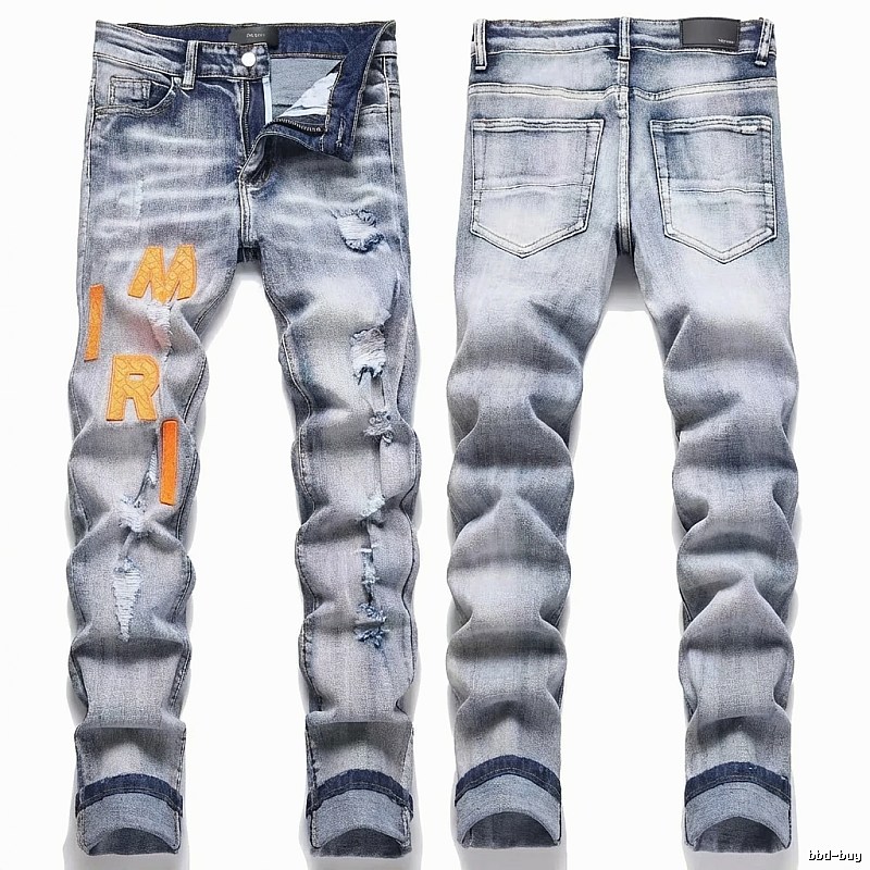 AMIRI Ripped Light Blue Jeans