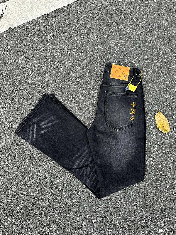 Graphic Jeans in Black with bold yellow marks and washed streetwear detailing - Evisu