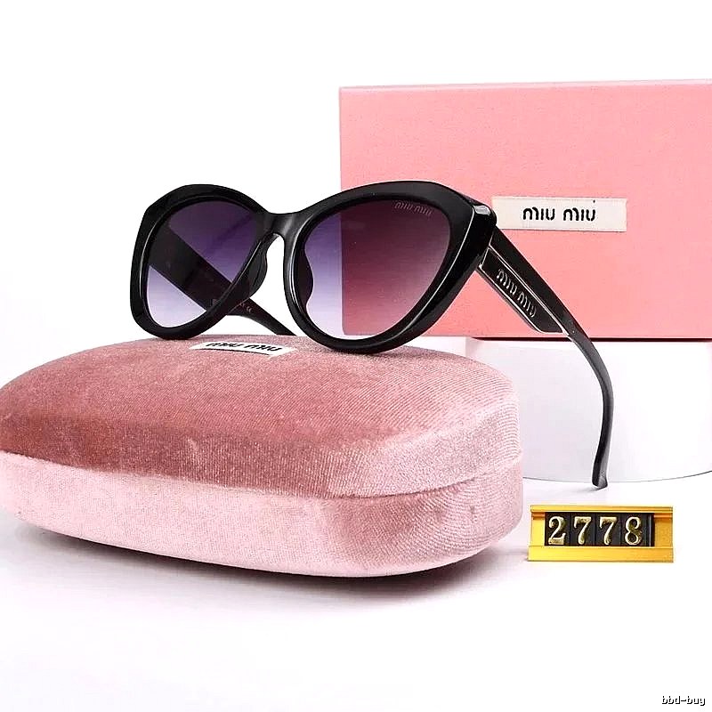 Miu Miu Travel Oversized sunglasses Black Oval Sunglasses with Modern Look