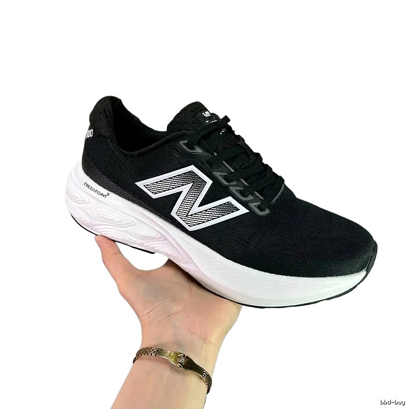 New Balance Fresh Foam X black and white sports shoes