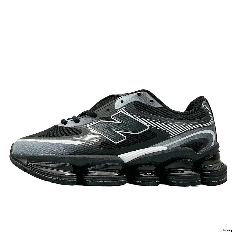 New Balance retro-style black and grey running shoes