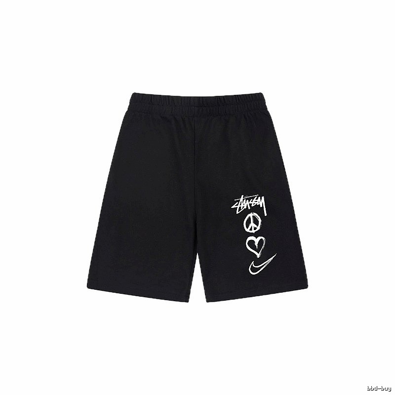 Stussy graffiti-style black shorts